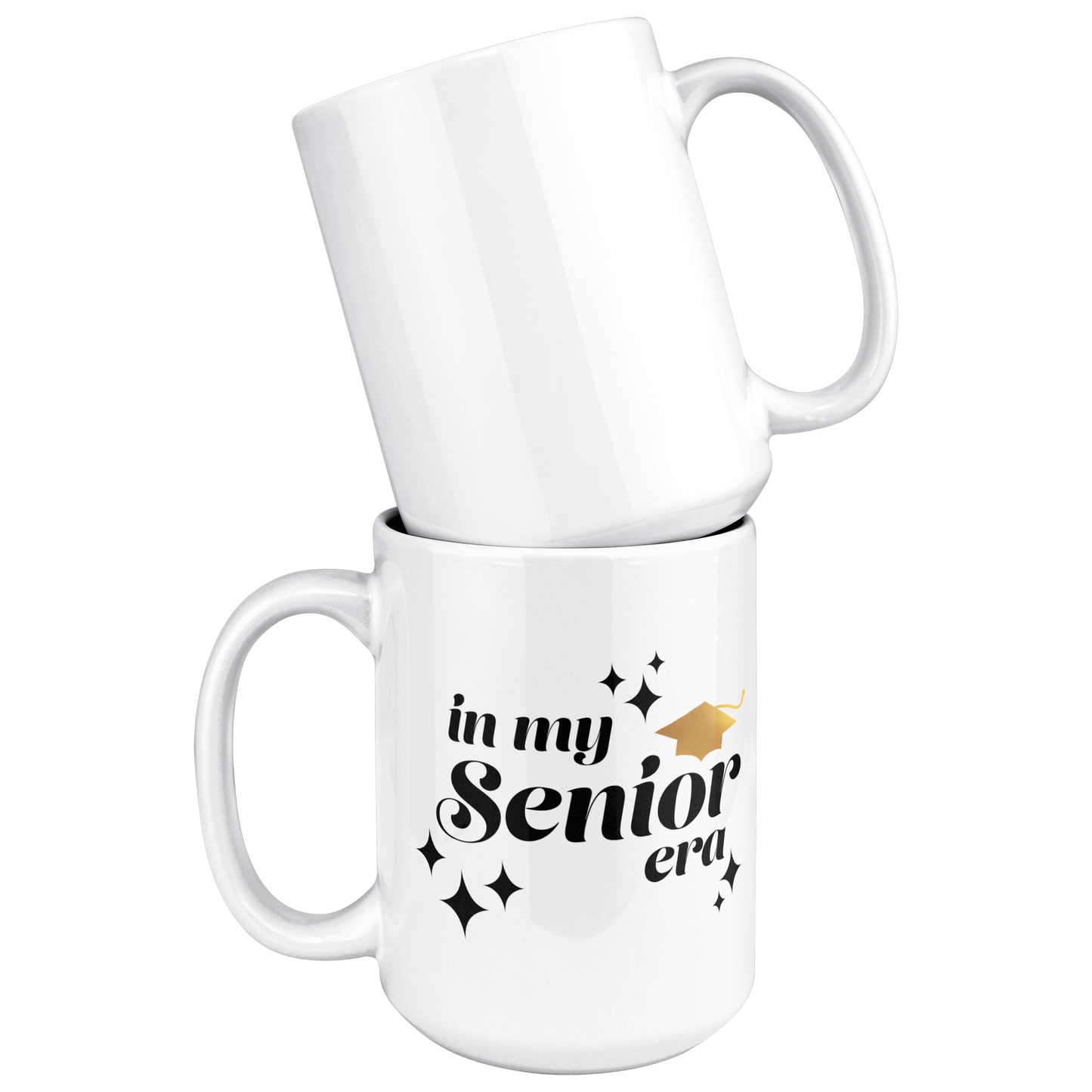 A plain white mug stacked on top of a white mug with the text "In My Senior Era" in black and a gold graduation cap.