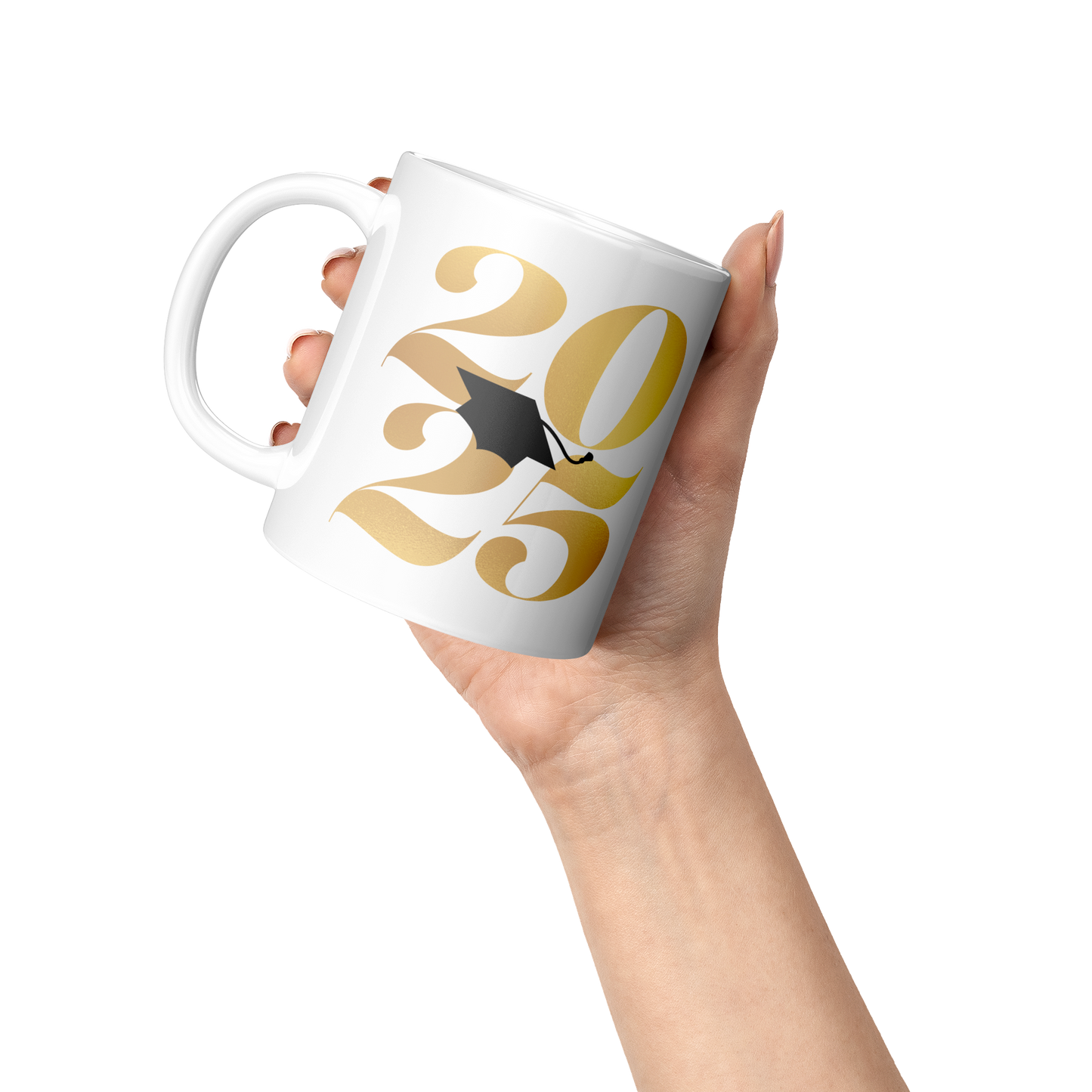 11oz white mug with 2025 in gold text and a black graduation cap in the middle being held by one hand at an angle.