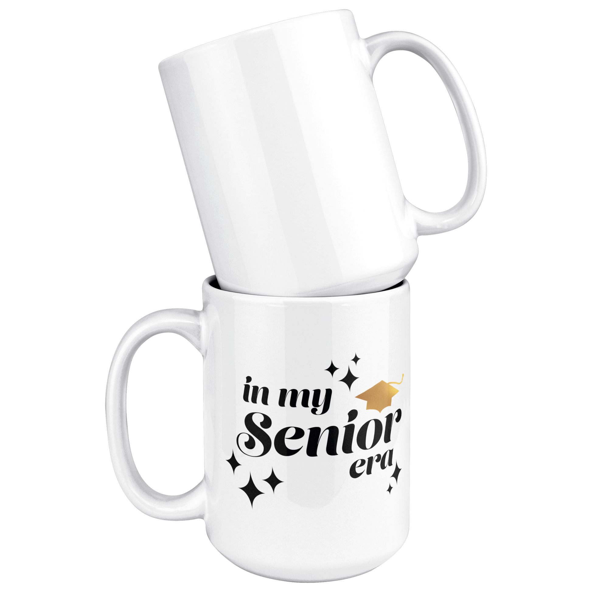 A plain white mug stacked on top of a white mug with the text "In My Senior Era" in black and a gold graduation cap. 