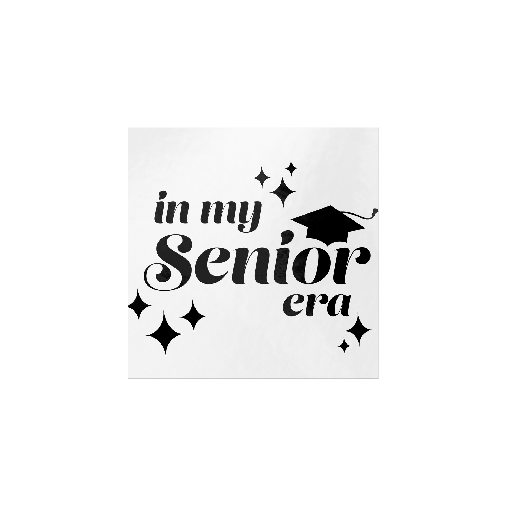 White square sticker with the phrase “In My Senior Era” and a graduation cap in black ink laying flat.